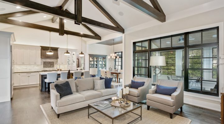 A beautifully designed interior with exposed wooden beams, demonstrating the custom remodeling and home improvement capabilities of Ponderosa Builders LLC.