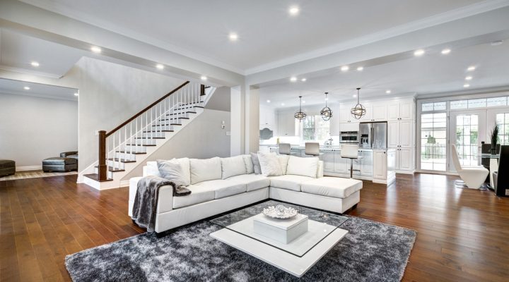 Expansive open concept living area featuring a modern kitchen, dining space, and lounge, perfect for family gatherings and entertaining.